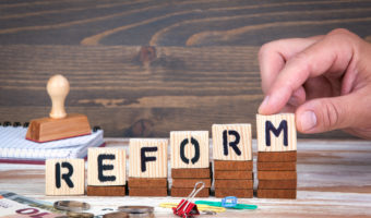 Reform in wooden block letters