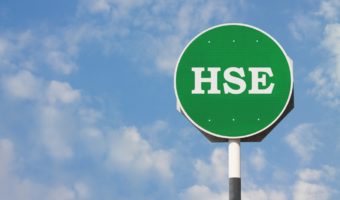 HSE sign on green background